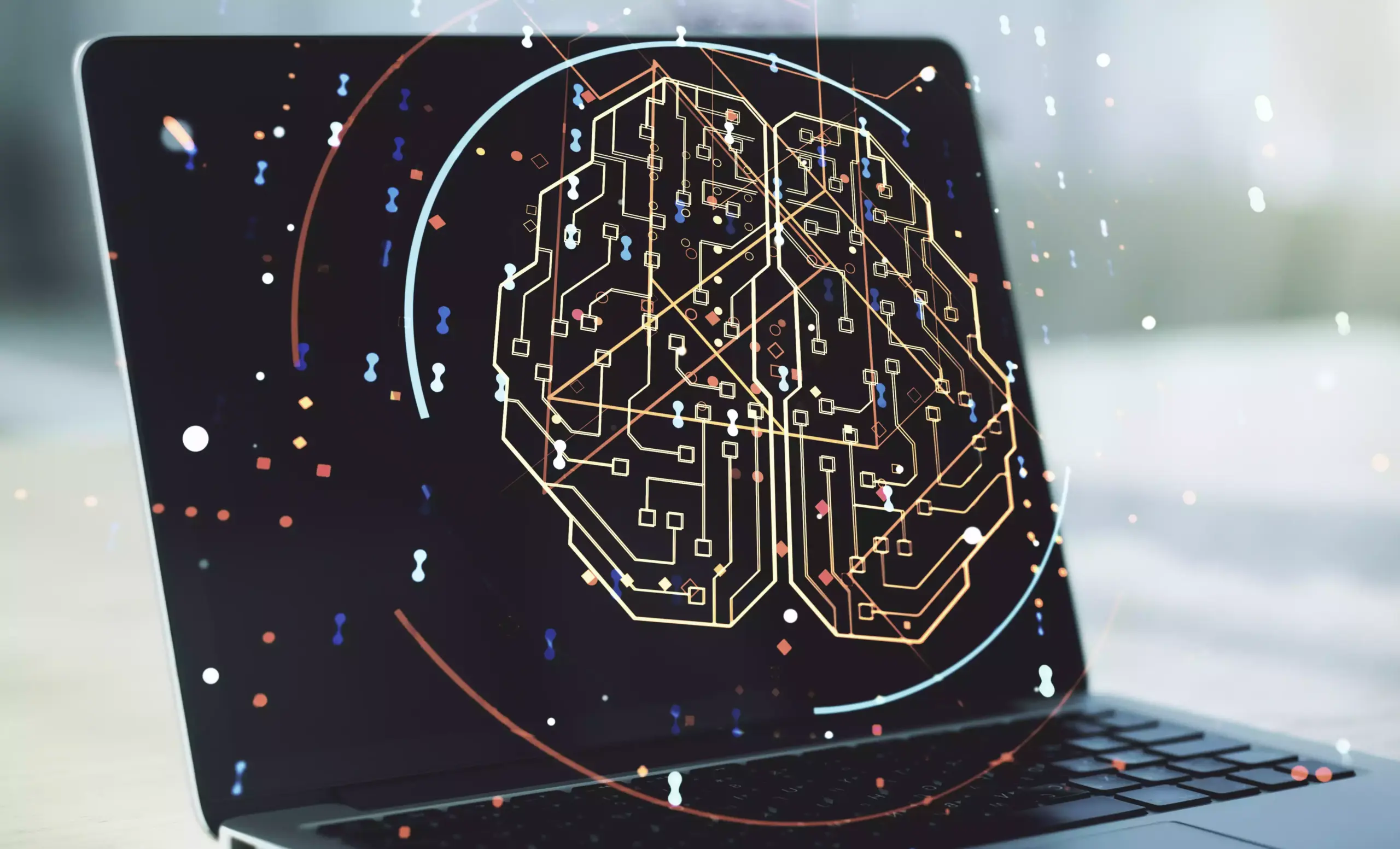 Una computadora portátil que muestra una ilustración digital de un cerebro formado por líneas de circuitos interconectados, representando la Inteligencia Artificial y su impacto en campos como el SEO y la publicidad digital.