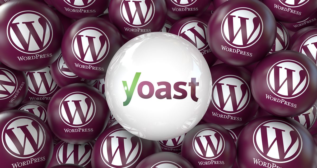 Un grupo de esferas granates con el logotipo de WordPress rodea una esfera central blanca con el logotipo de Yoast.