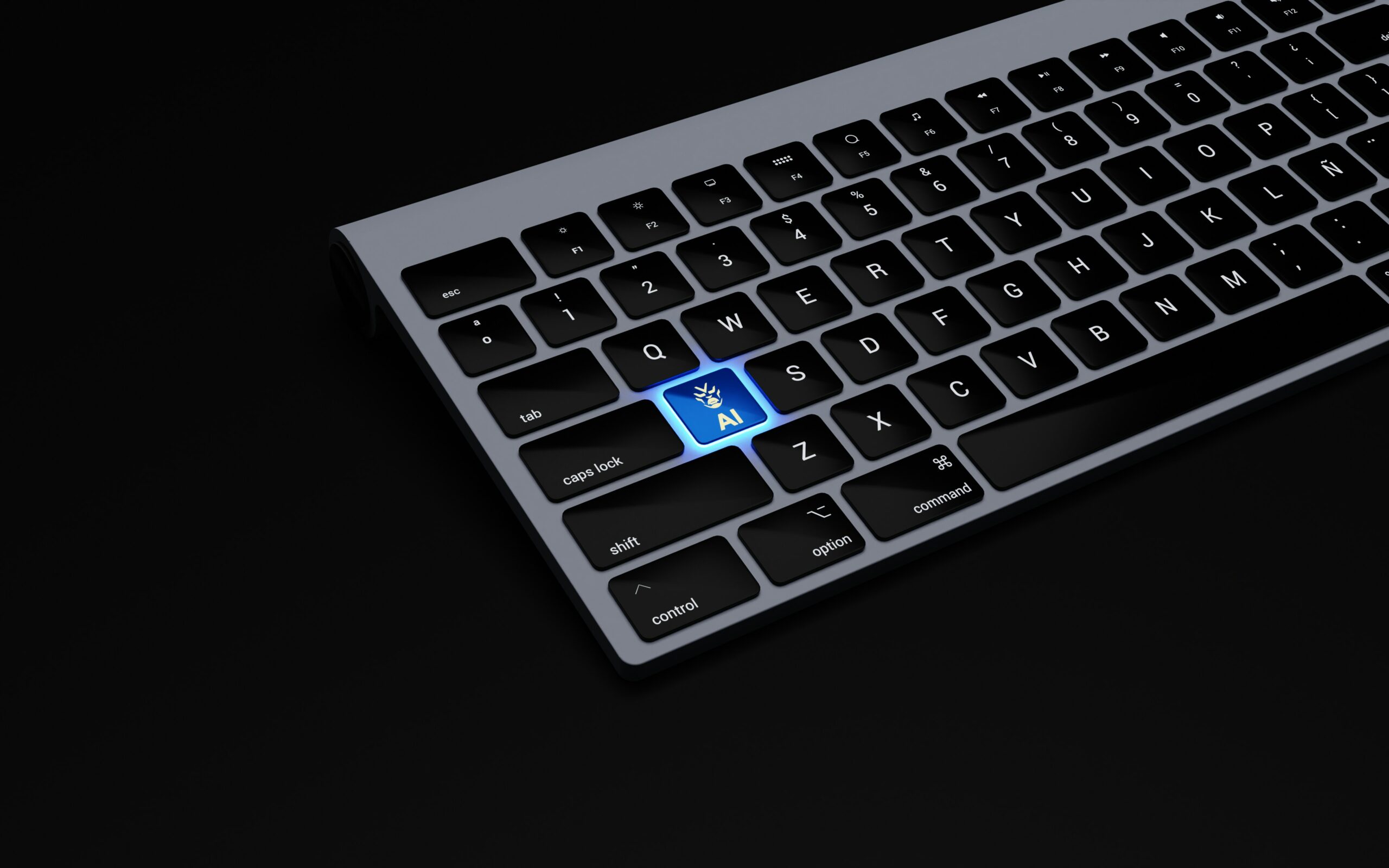 Un teclado de ordenador con una tecla azul que pone "IA" y el icono de una mano robótica, situada donde normalmente estaría la tecla de retorno.