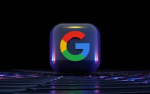 Icono del logotipo de Google renderizado en 3D con colores rojo, azul, amarillo y verde sobre una superficie oscura y reflectante con fondo negro.